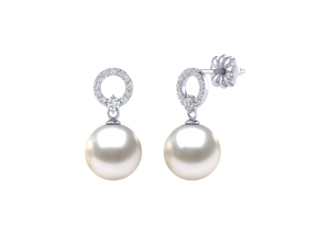 A natural color lustrous TRUE AAA QUALITY Australian South Sea Pearl Earring set features two 8mm South Sea cultured pearls. The Metal is 14K White Gold. The gram weight in this piece is approximately 1.9.