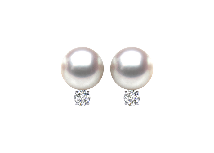 A natural color lustrous TRUE AAA QUALITY Australian South Sea Pearl Earring set features two 9mm South Sea cultured pearls. The Metal is 14K White Gold. The gram weight in this piece is approximately 1.45.