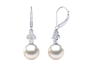 A natural color lustrous TRUE AAA QUALITY Australian South Sea Pearl Earring set features two 8mm South Sea cultured pearls. The Metal is 14K Yellow Gold. The gram weight in this piece is approximately 1.84.