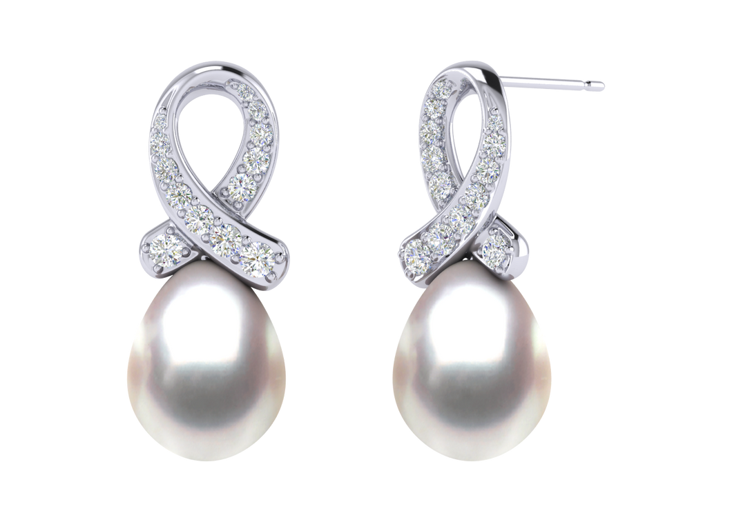 A natural color lustrous TRUE AAA QUALITY Australian South Sea Pearl Earring set features two 9mm South Sea cultured pearls. The Metal is 14K White Gold. The gram weight in this piece is approximately 2.14.