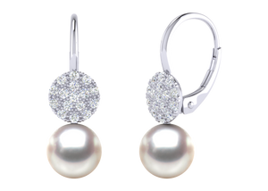 A natural color lustrous TRUE AAA QUALITY Australian South Sea Pearl Earring set features two 8mm South Sea cultured pearls. The Metal is 14K White Gold. The gram weight in this piece is approximately 4.89.