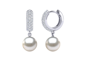 A natural color lustrous TRUE AAA QUALITY Australian South Sea Pearl Earring set features two 13mm South Sea cultured pearls. The Metal is 14K Yellow Gold. The gram weight in this piece is approximately 0.85.