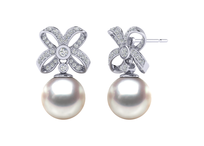 A natural color lustrous TRUE AAA QUALITY Australian South Sea Pearl Earring set features two 10mm South Sea cultured pearls. The Metal is 14K White Gold. The gram weight in this piece is approximately 0.6.