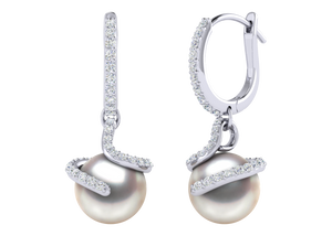 A natural color lustrous TRUE AAA QUALITY Australian South Sea Pearl Earring set features two 12mm South Sea cultured pearls. The Metal is 14K White Gold. The gram weight in this piece is approximately 2.32.