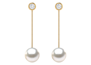 A natural color lustrous TRUE AAA QUALITY Australian South Sea Pearl Earring set features two 13mm South Sea cultured pearls. The Metal is 14K Yellow Gold. The gram weight in this piece is approximately 1.15.