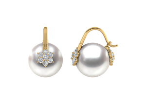 A natural color lustrous TRUE AAA QUALITY Australian South Sea Pearl Earring set features two 13mm South Sea cultured pearls. The Metal is 14K Yellow Gold. The gram weight in this piece is approximately 1.27.
