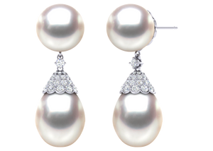 A natural color lustrous TRUE AAA QUALITY Australian South Sea Pearl Earring set features two 16mm South Sea cultured pearls. The Metal is 14K White Gold. The gram weight in this piece is approximately 3.47.