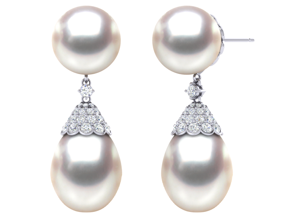 A natural color lustrous TRUE AAA QUALITY Australian South Sea Pearl Earring set features two 16mm South Sea cultured pearls. The Metal is 14K White Gold. The gram weight in this piece is approximately 3.47.